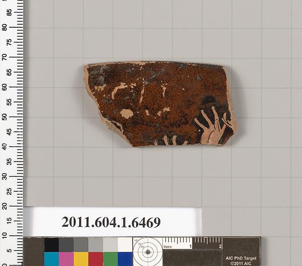 Terracotta rim fragment of a kylix (drinking cup)