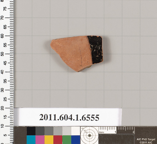 Terracotta fragment of a kylix (drinking cup)