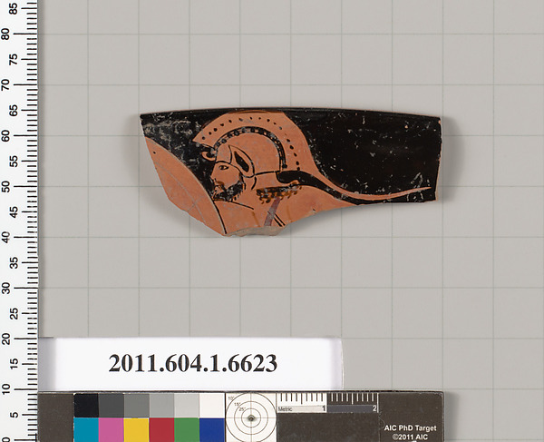 Terracotta rim fragment of a kylix (drinking cup)