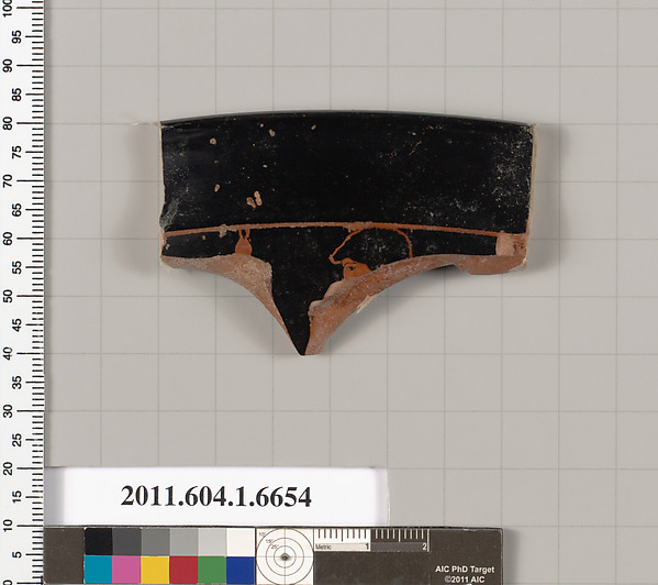 Terracotta rim fragment of a kylix (drinking cup)