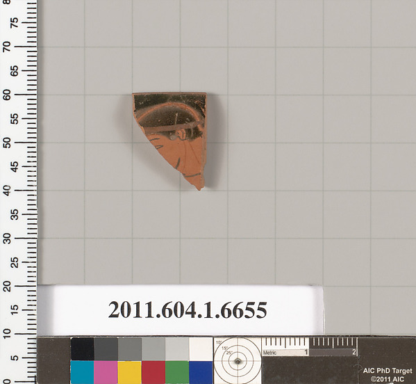 Terracotta rim fragment of a kylix (drinking cup)