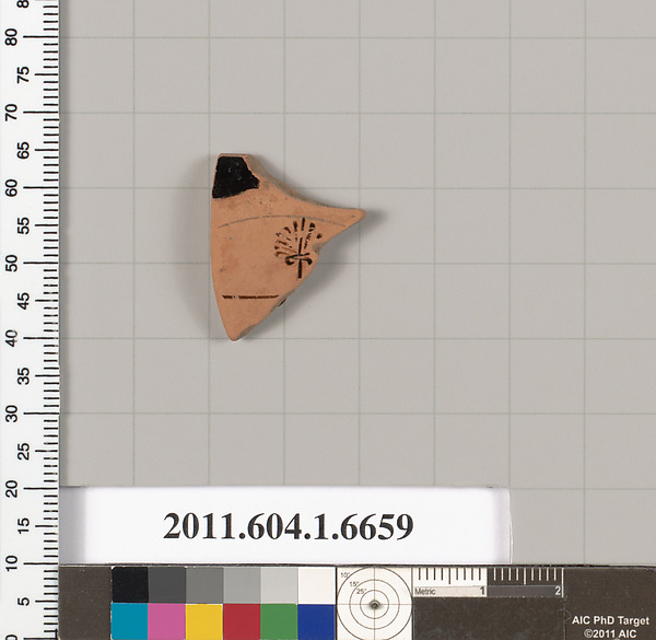 Terracotta rim fragment of a kylix (drinking cup)