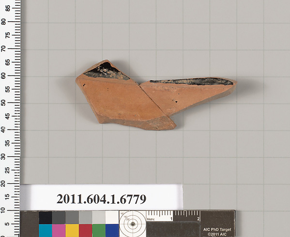 Terracotta fragment of a kylix (drinking cup)