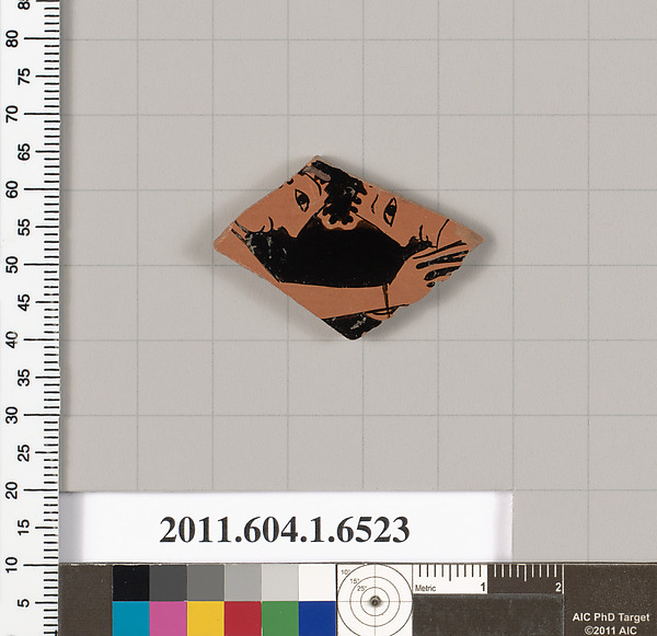 Terracotta fragment of a kylix (drinking cup)