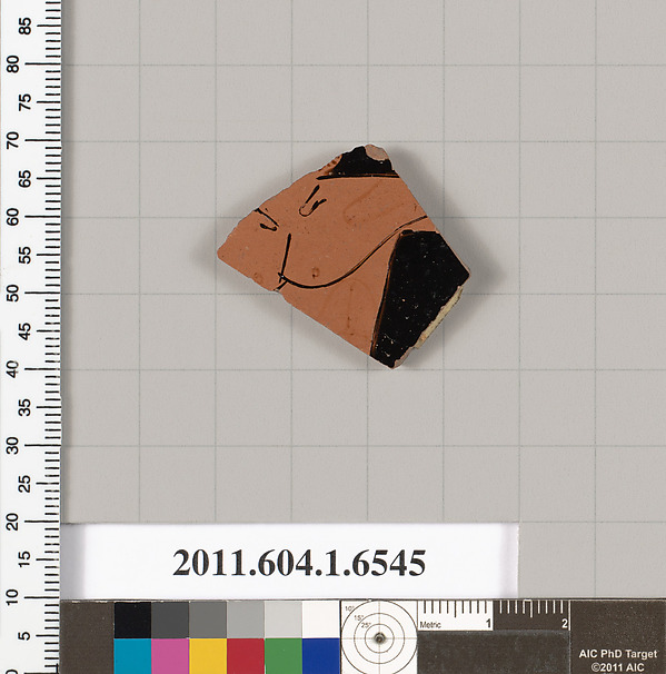 Terracotta fragment of a kylix (drinking cup)