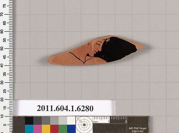 Terracotta fragment of a kylix (drinking cup)