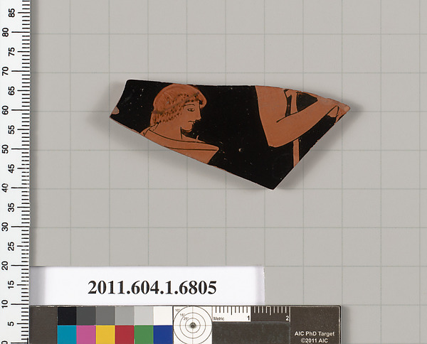 Terracotta fragment of a kylix (drinking cup)