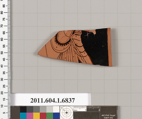 Terracotta fragment of a kylix (drinking cup)