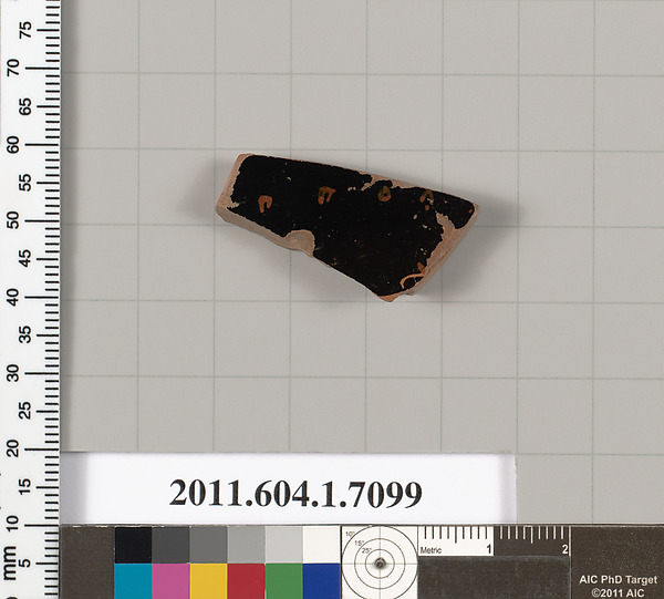 Terracotta fragment of a kylix (drinking cup)
