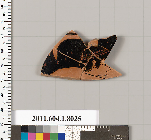 Terracotta fragment of a kylix (drinking cup)