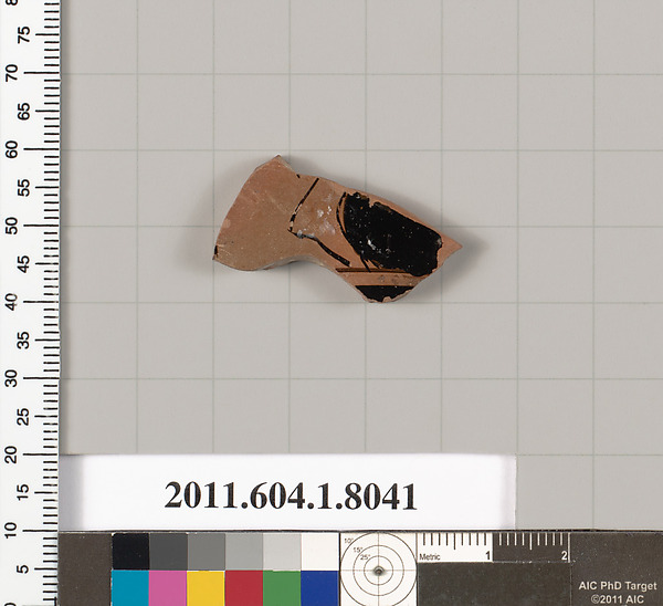 Terracotta fragment of a kylix (drinking cup)