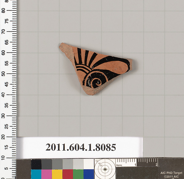 Terracotta fragment of a kylix (drinking cup)