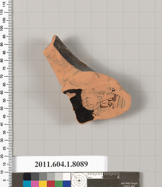 Terracotta fragment of a kylix (drinking cup)