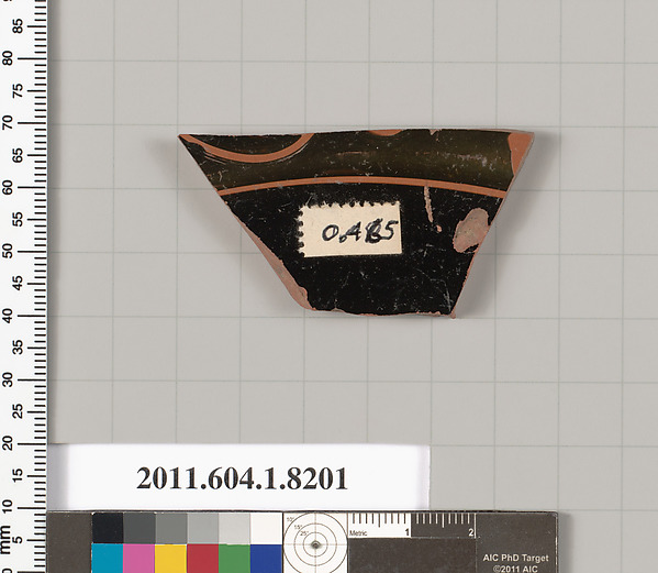 Terracotta fragment of a kylix (drinking cup)