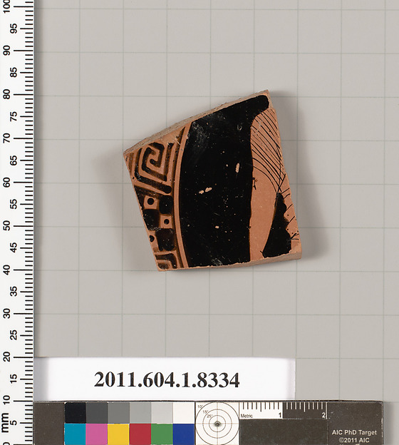 Terracotta fragment of a kylix (drinking cup)
