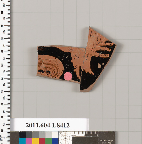 Terracotta fragment of a kylix (drinking cup)