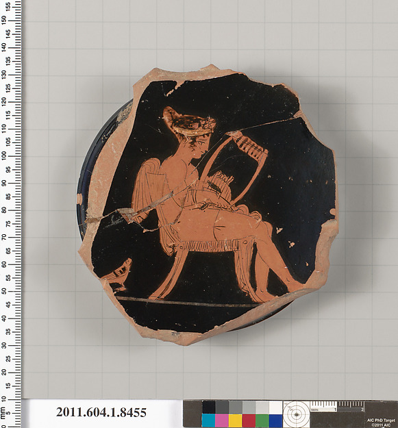 Terracotta fragment of a stemless kylix (drinking cup)