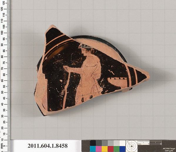 Terracotta fragment of a stemless kylix (drinking cup)
