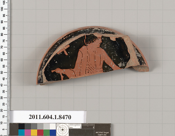 Terracotta fragment of a stemless kylix (drinking cup)