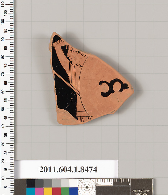Terracotta fragment of a stemless kylix (drinking cup)