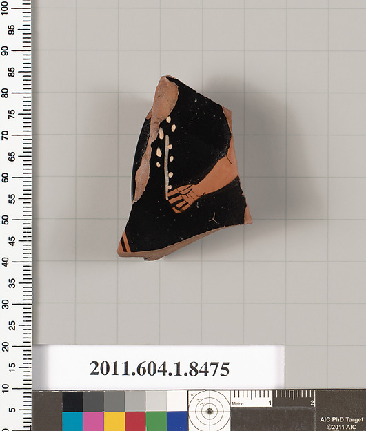Terracotta fragment of a stemless kylix (drinking cup)