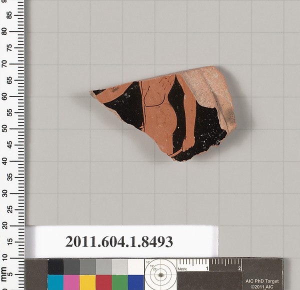 Terracotta fragment of a stemless kylix (drinking cup)