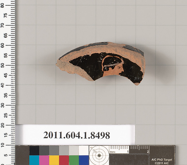 Terracotta fragment of a stemless kylix (drinking cup)