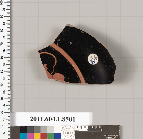 Terracotta fragment of a stemless kylix (drinking cup)