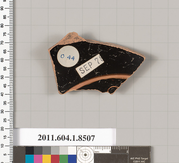 Terracotta fragment of a stemless kylix (drinking cup)