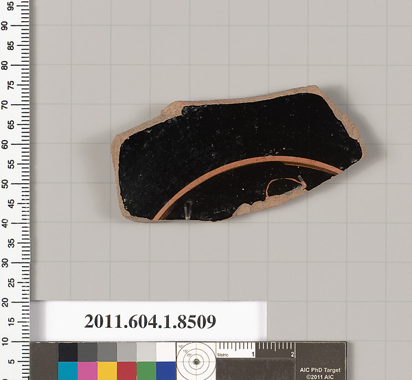 Terracotta fragment of a stemless kylix (drinking cup)