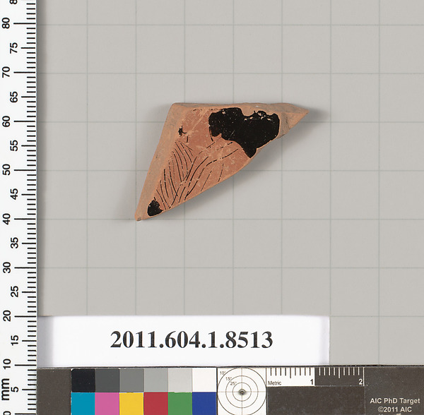 Terracotta fragment of a stemless kylix (drinking cup)