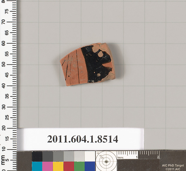 Terracotta fragment of a stemless kylix (drinking cup)