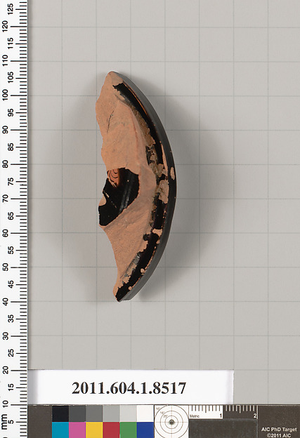 Terracotta fragment of a stemless kylix (drinking cup)