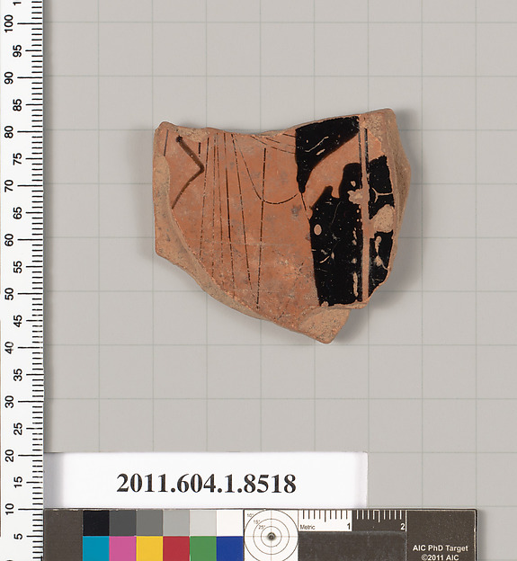 Terracotta fragment of a stemless kylix (drinking cup)