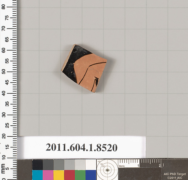 Terracotta fragment of a stemless kylix (drinking cup)