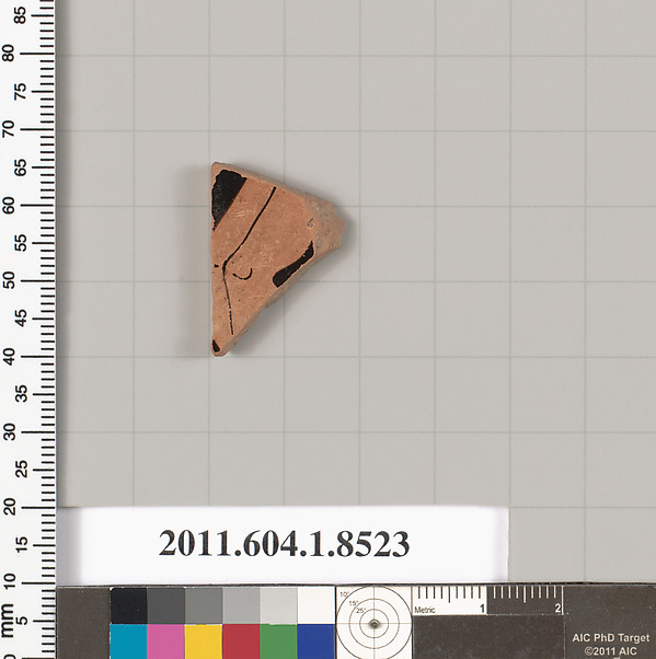 Terracotta fragment of a stemless kylix (drinking cup)