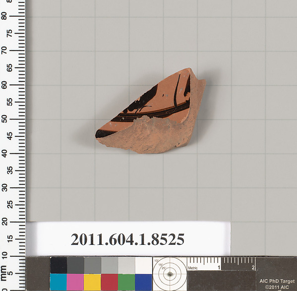 Terracotta fragment of a stemless kylix (drinking cup)