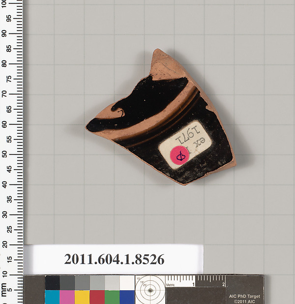 Terracotta fragment of a stemless kylix (drinking cup)