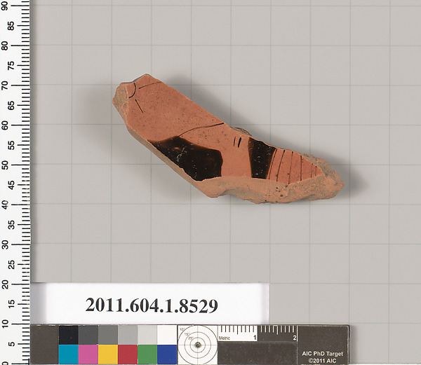 Terracotta fragment of a stemless kylix (drinking cup)