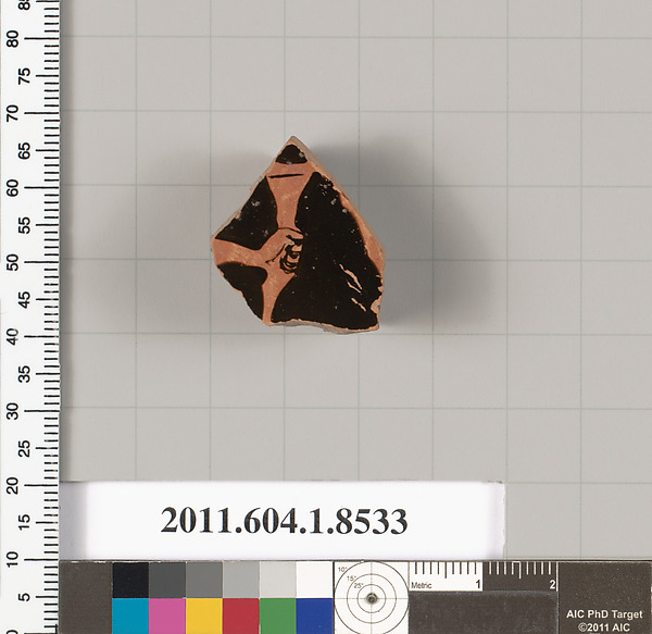Terracotta fragment of a stemless kylix (drinking cup)