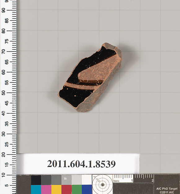 Terracotta fragment of a stemless kylix (drinking cup)