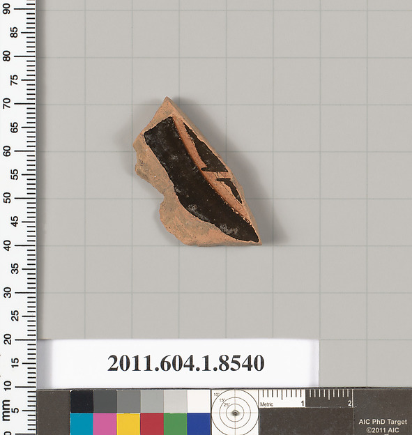 Terracotta fragment of a stemless kylix (drinking cup)
