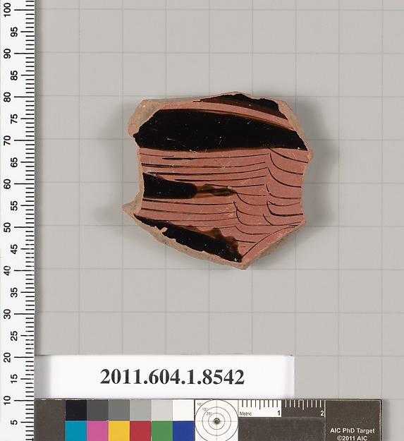 Terracotta fragment of a stemless kylix (drinking cup)