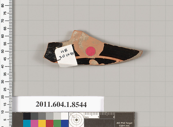 Terracotta fragment of a stemless kylix (drinking cup)