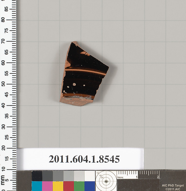 Terracotta fragment of a stemless kylix (drinking cup)