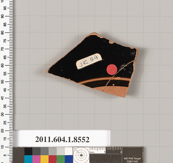 Terracotta fragment of a stemless kylix (drinking cup)