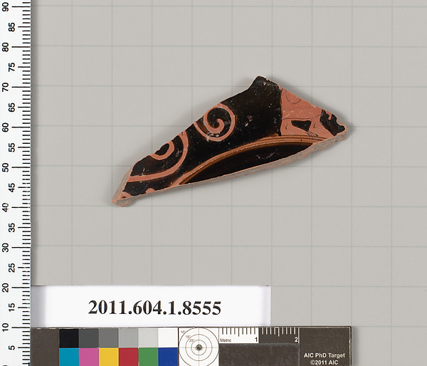 Terracotta fragment of a stemless kylix (drinking cup)