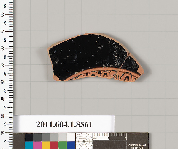 Terracotta fragment of a stemless kylix (drinking cup)