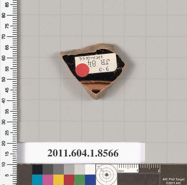 Terracotta fragment of a stemless kylix (drinking cup)