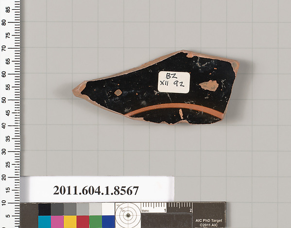 Terracotta fragment of a stemless kylix (drinking cup)
